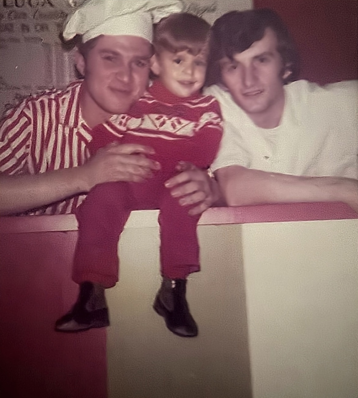 1972 — Michael (center, age 2) with Nino (right) while working at the pizzeria in the Wyoming Valley Mall