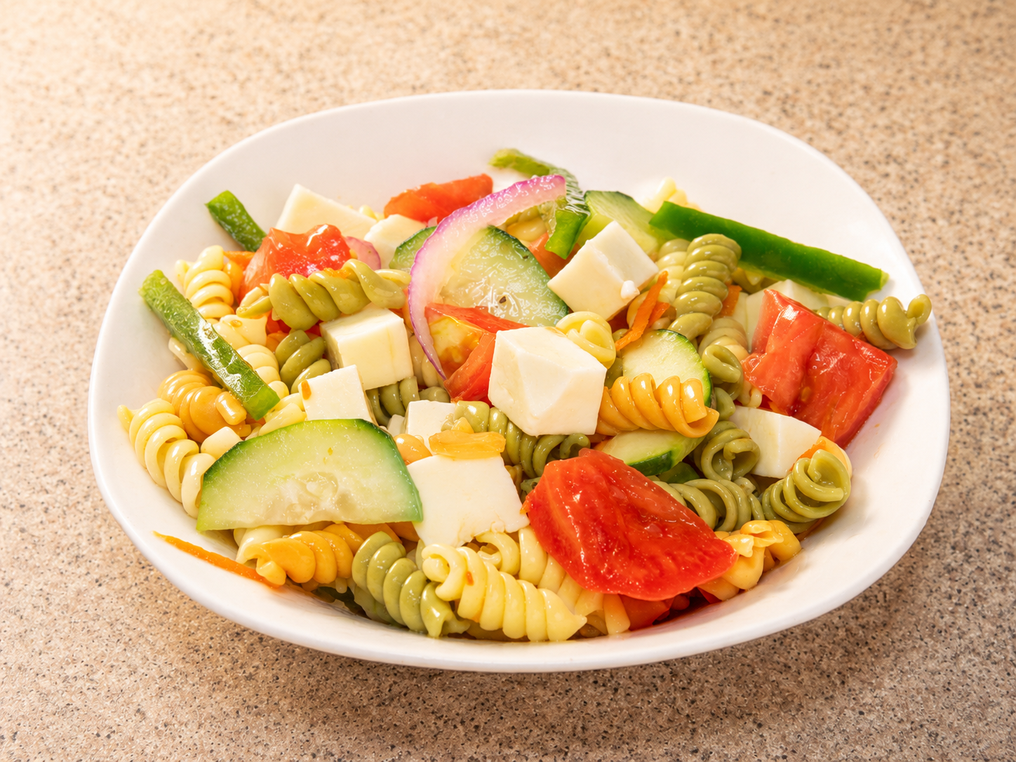 Tomato and cheese pasta salad